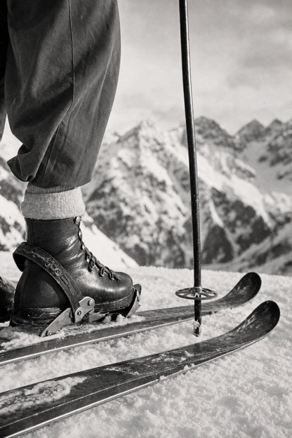 Vintage Ski Boots and Skis on Snowy Mountain | Retro Winter Sports Wall Art | Black and White Photography Print Poster