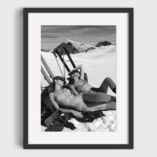 Women Sunbathing on Snowy Slopes in Bikinis | Soak Up the Sun: Unconventional Ski Resort Moments | Vintage Ski Posters Series