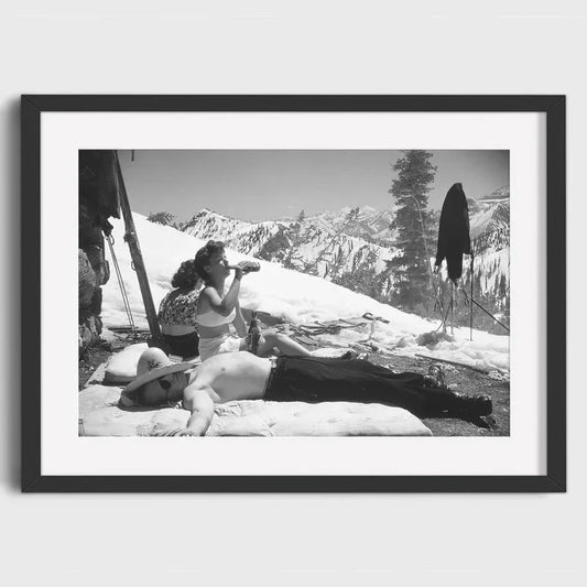 Lone Skier Enjoying a Drink on a Mountain | Solitary Ski Moments: Savor the Peaks in Style | Collectible Vintage Ski Posters